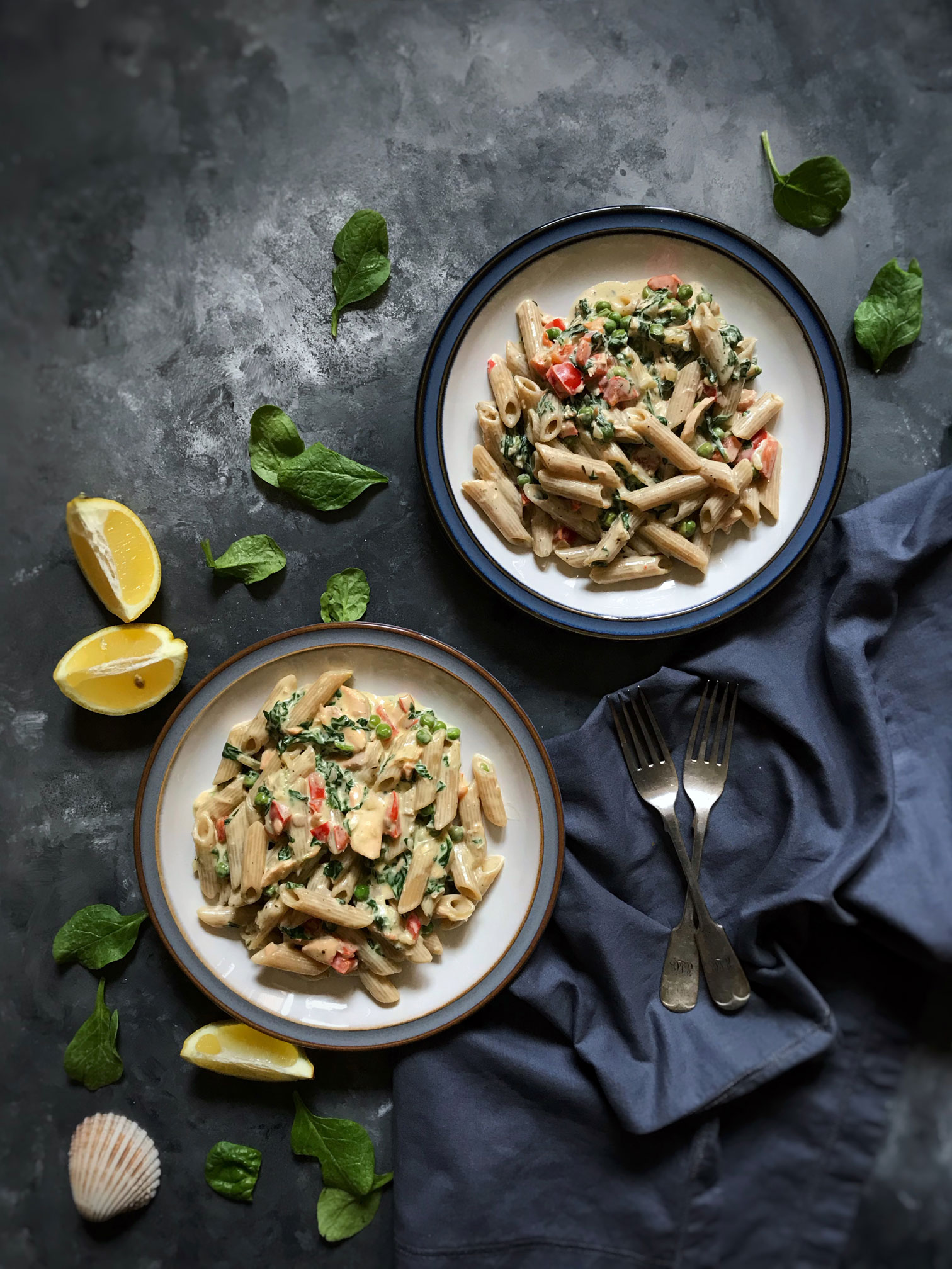 Salmon and veggies whole-wheat pasta in a dairy free cream sauce