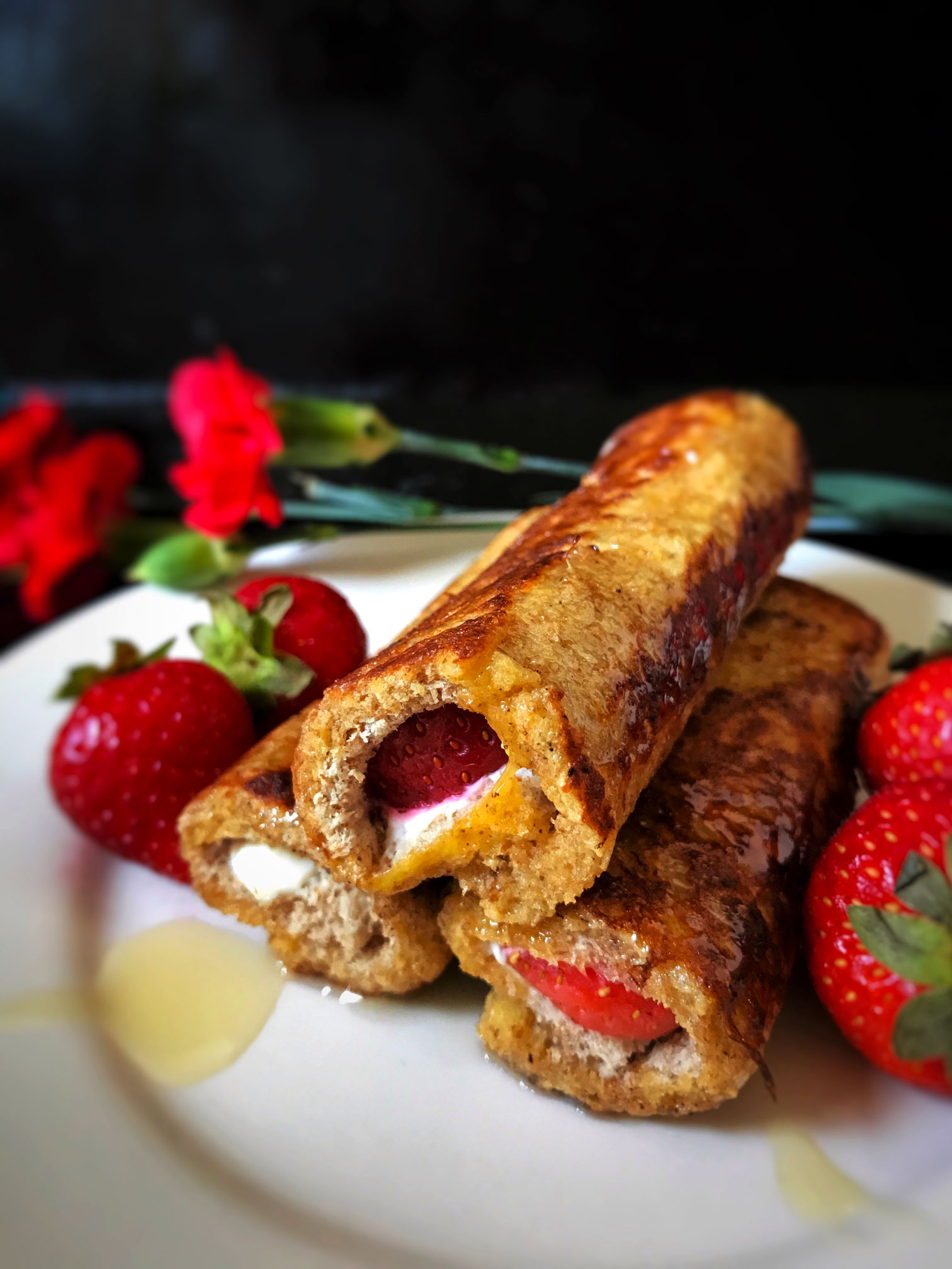 French toast rolls filled with cream cheese and strawberries