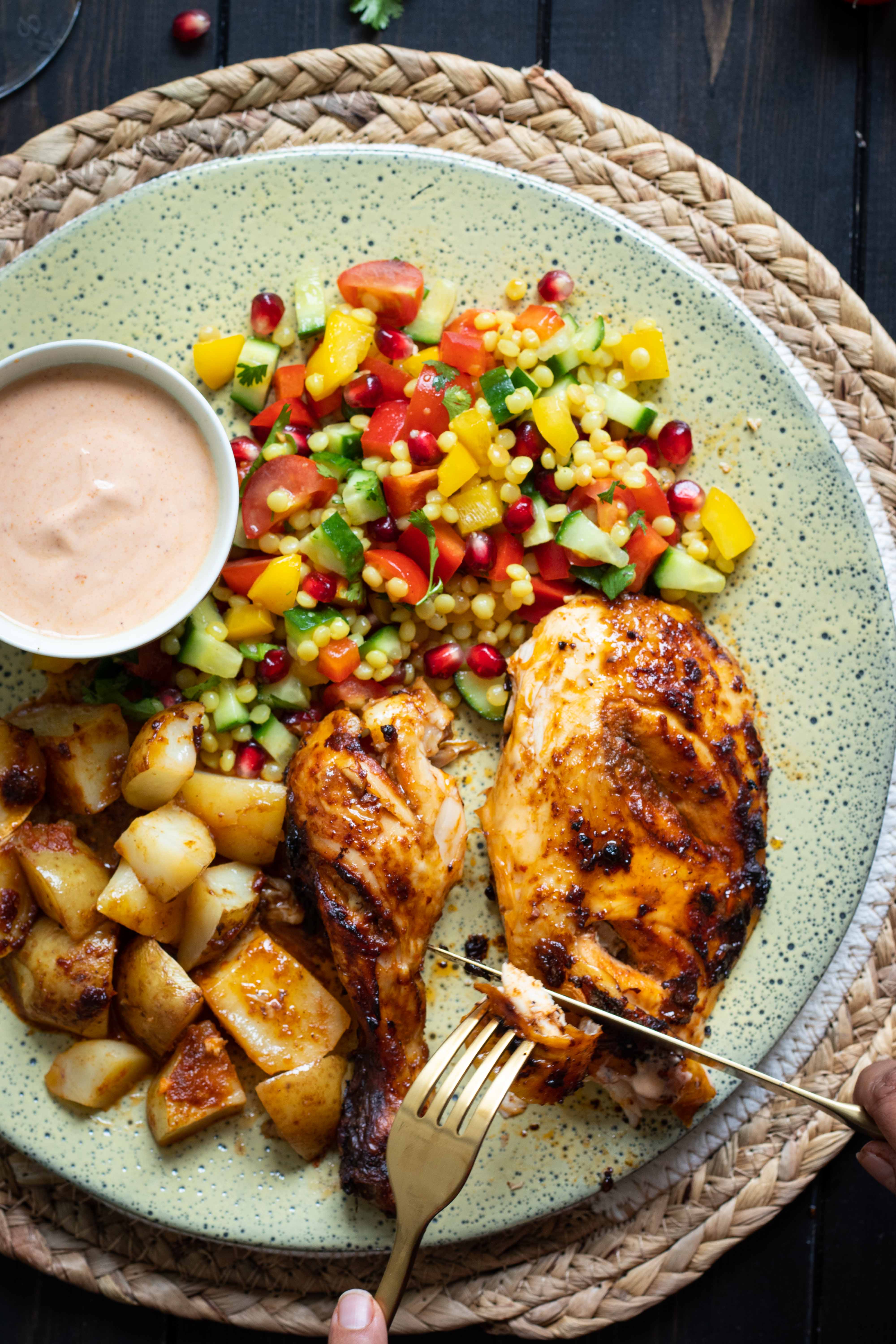 Harissa grilled chicken with Israeli couscous salad