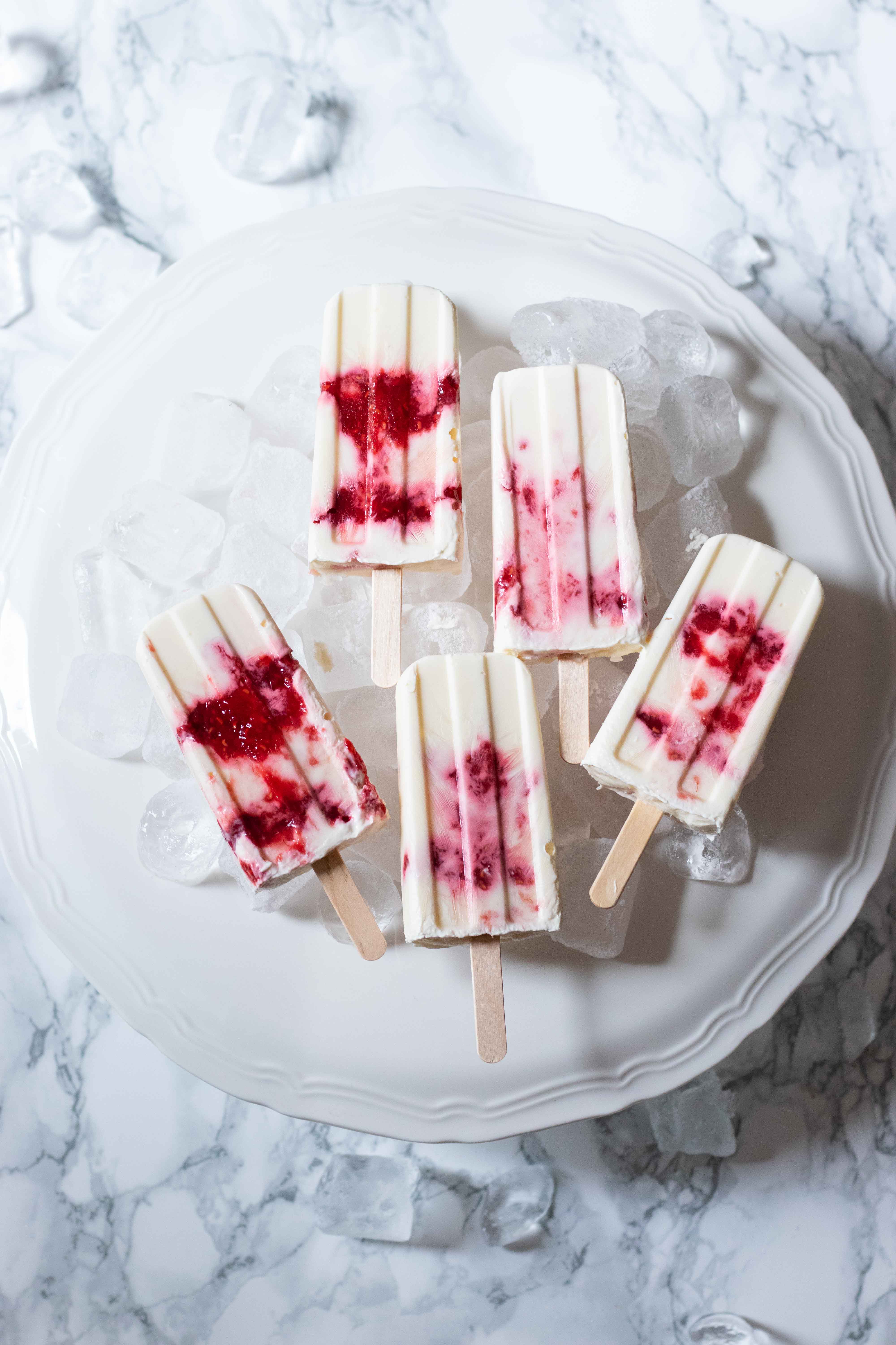 greek yogurt and berry jam popsicles