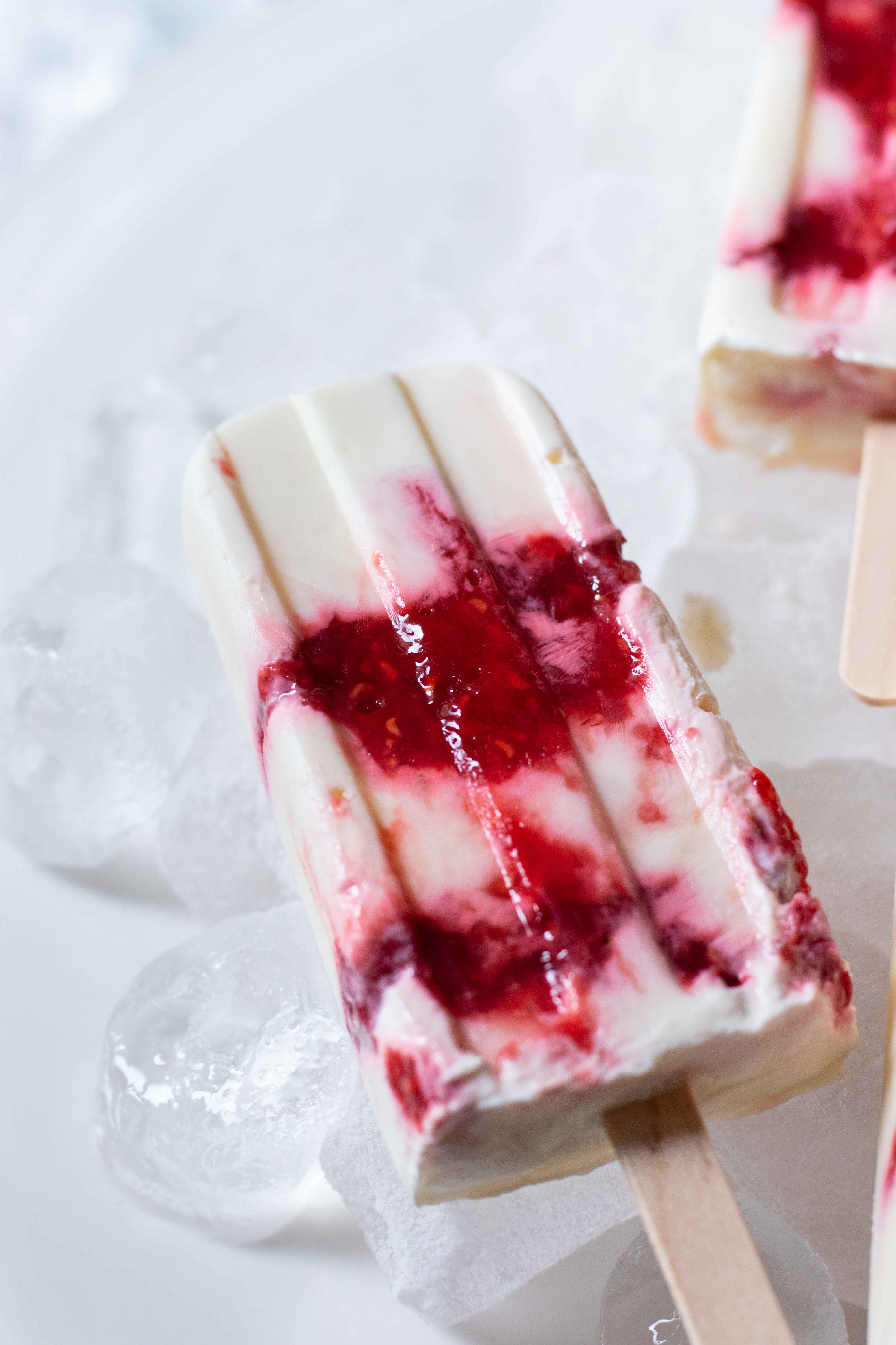 greek yogurt and berry jam popsicles