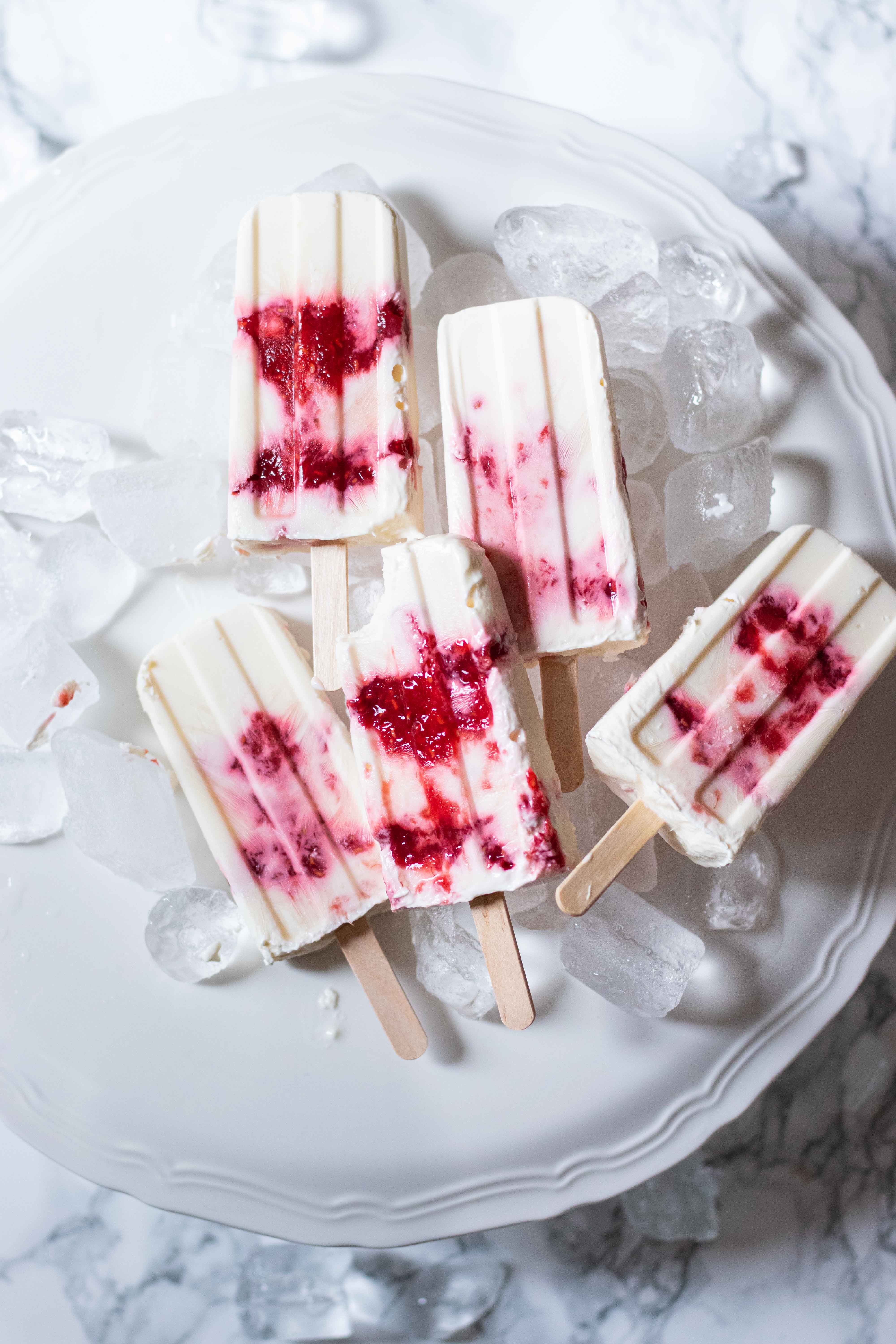 greek yogurt and berry jam popsicles